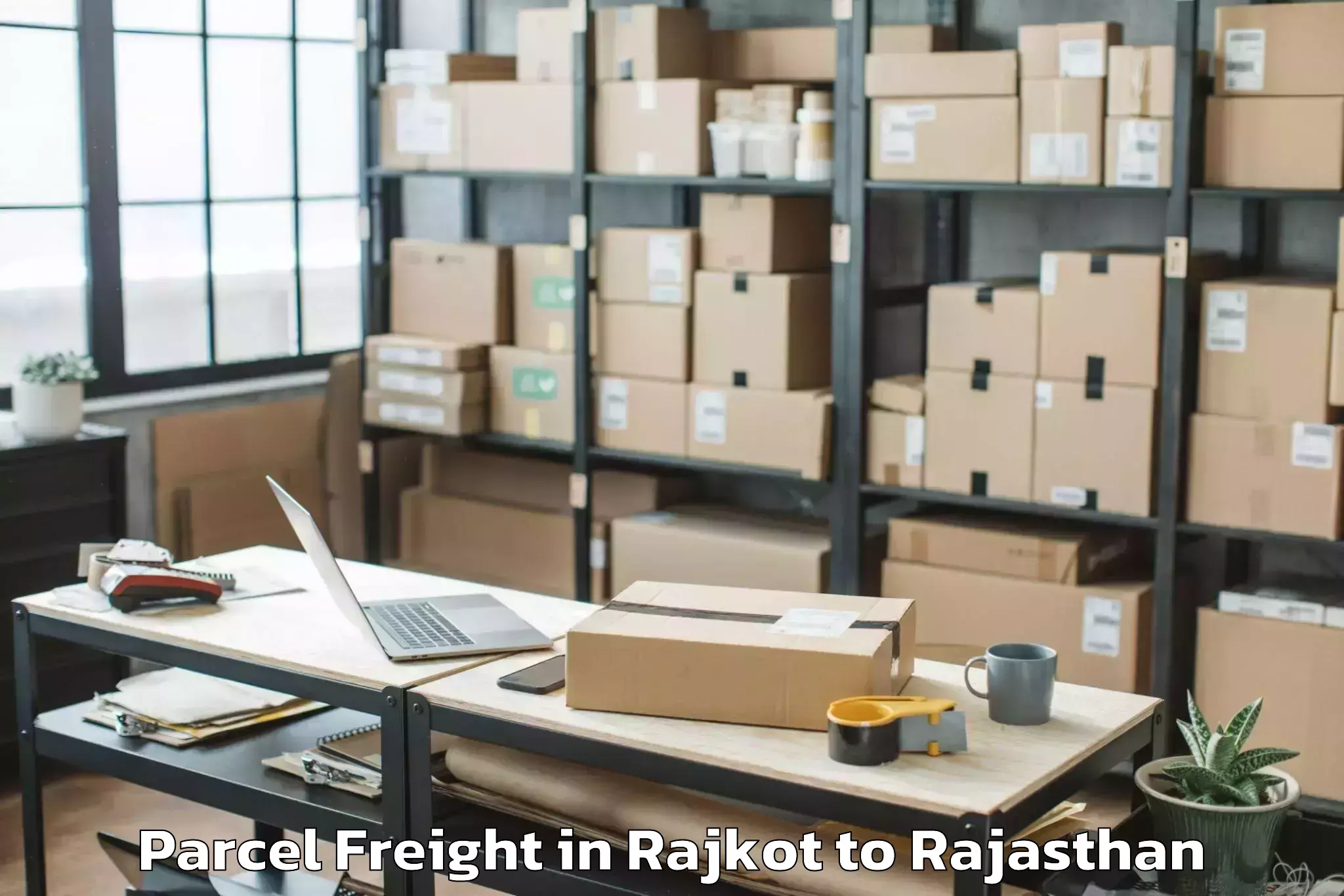 Leading Rajkot to Haridev Joshi University Of Jo Parcel Freight Provider